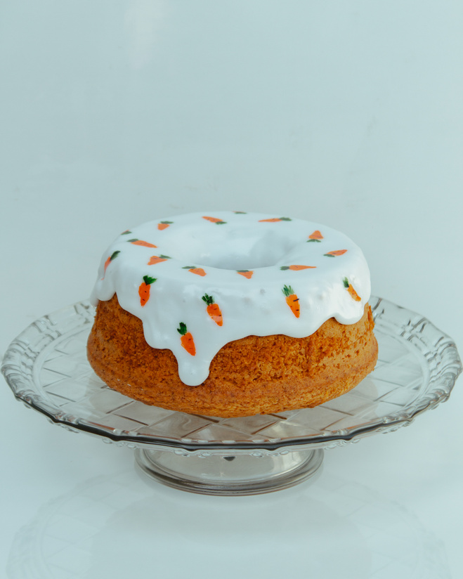 A Carrot Cake on Glass Cake Stand